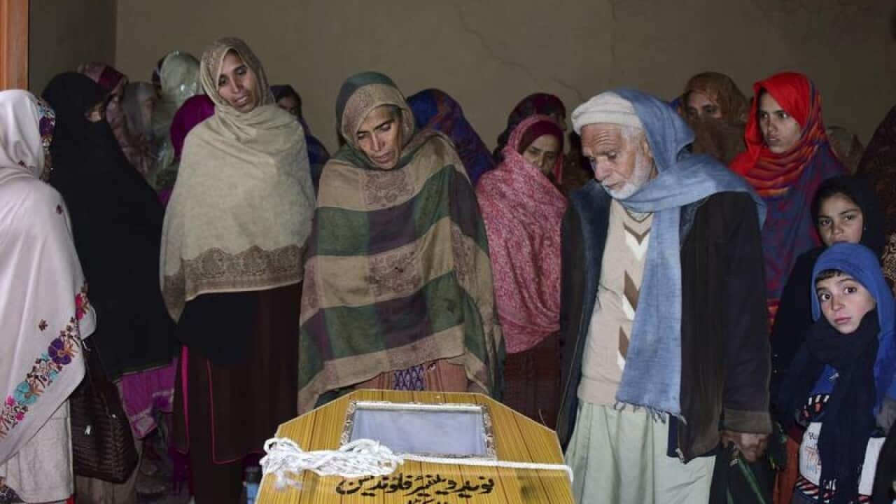 The coffin of a Pakistani boy killed by Indian shelling in Kashmir