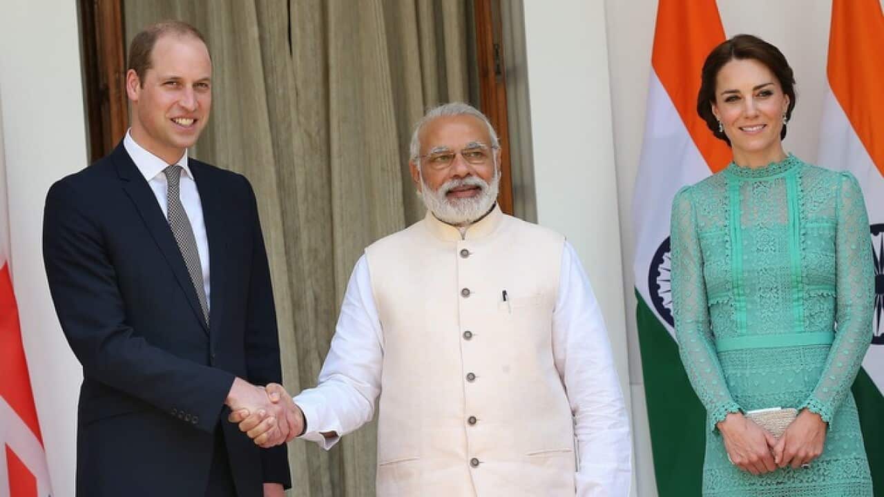Indian prime minister Narendra Modi (C) shake hands with Britain's Prince William as his wife looks on prior to a meeting at Hyderabad House in New Delhi, India 12 April 2016. Prince William and his wife Catherine are on a visit to India and Bhutan from