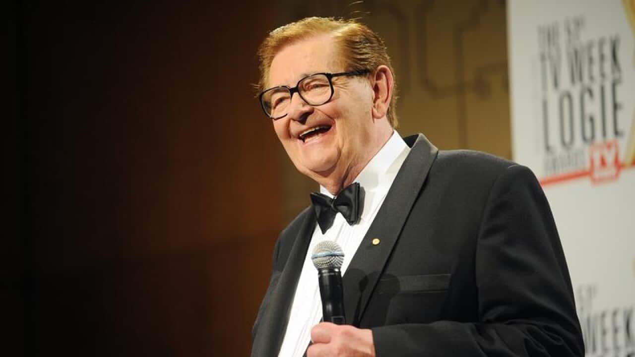 Gold Logie winner Bill Collins poses for photographs.