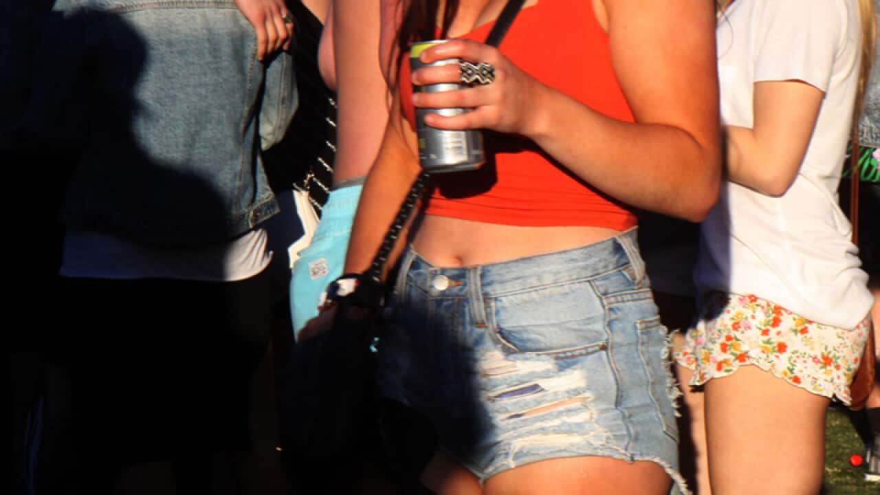 People seen at a music festival