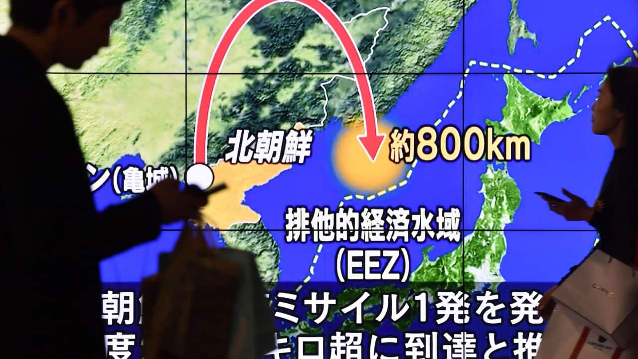 A TV screen on the streets of Tokyo on May 14, 2017, shows news of a North Korean missile test.