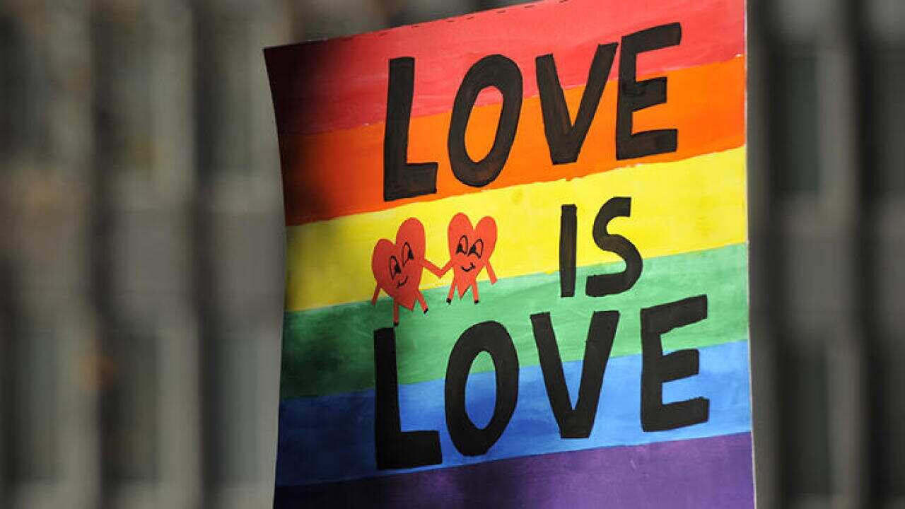 Supporters attend a marriage equality rally in Sydney