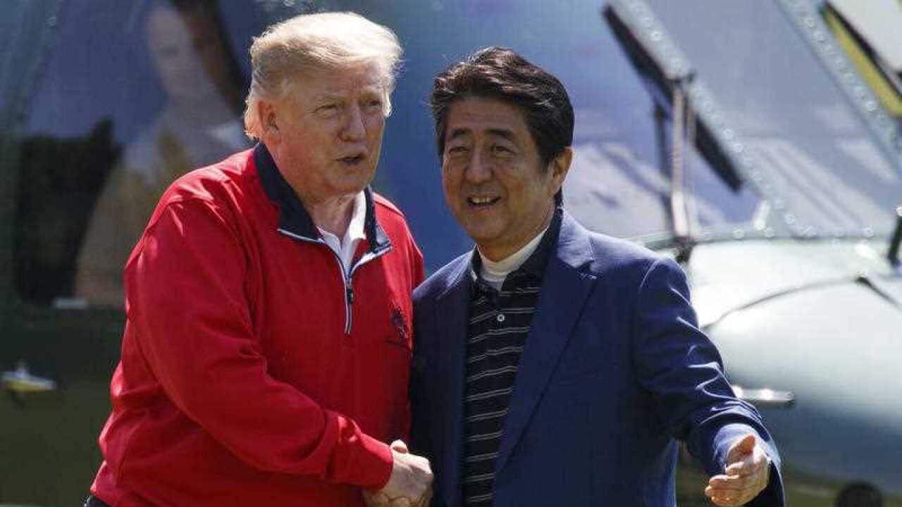 President Donald Trump referred to Prime Minister Shinzo Abe as his "golf buddy".
