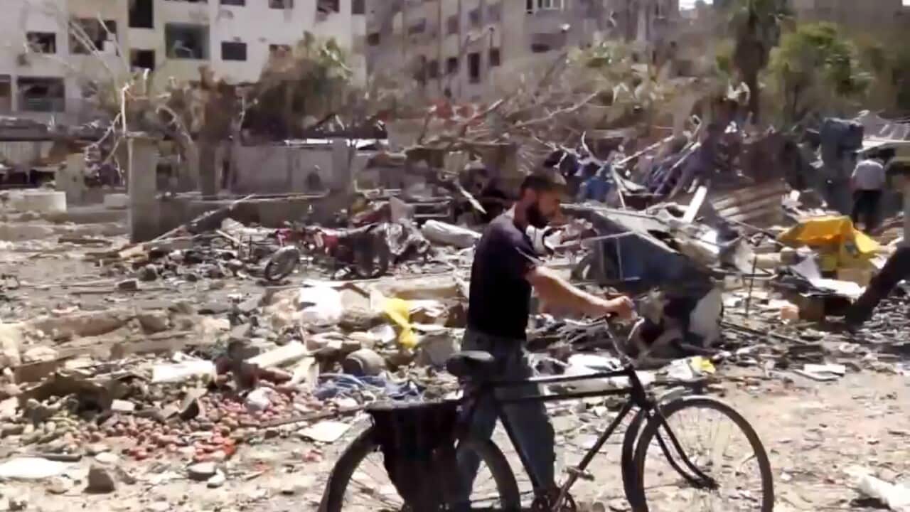 This image made from video posted online shows the aftermath of Syrian government airstrikes in Douma, a suburb of Damascus, Syria. (Shaam News Network via AP video)