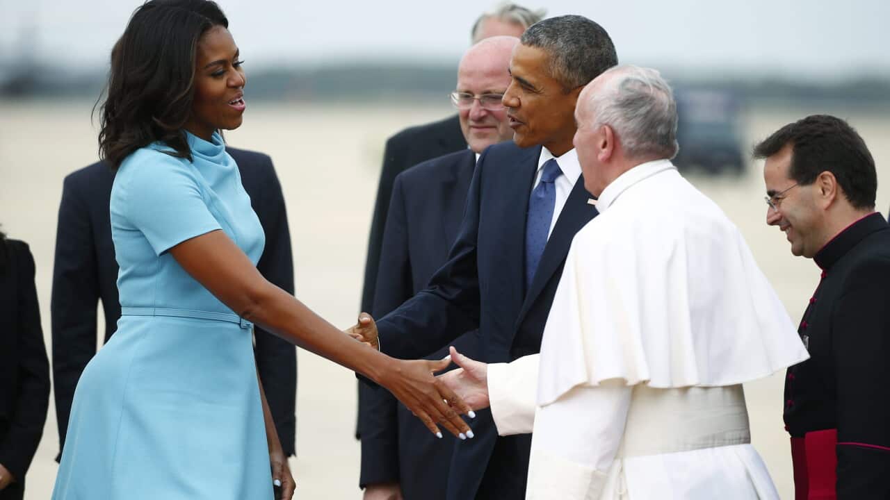 US First Lady Michelle Obama (L) US President Barack Obama (3-R) welcome Pope Francis (2-R) to the United States upon his arrival at Joint Base Andrews outside Washington DC, USA, 22 September 2015. (EPA/TONY GENTILE / POOL)