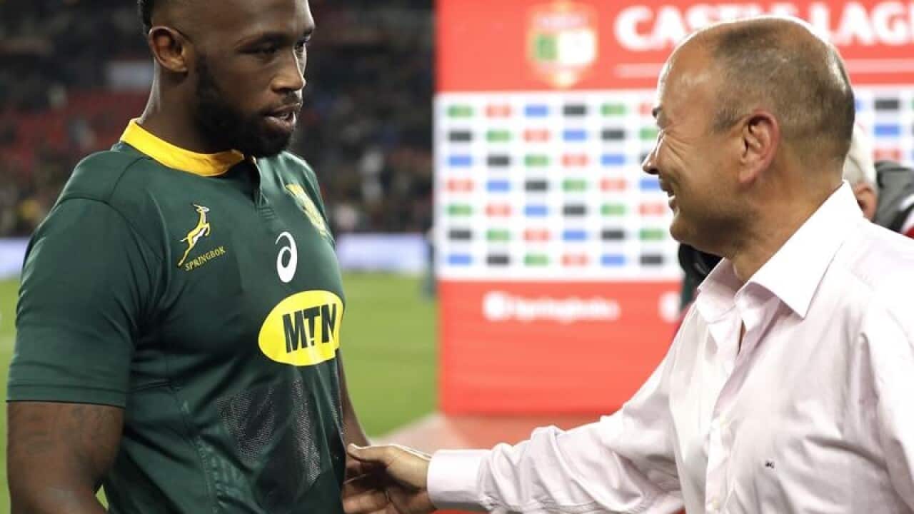 Eddie Jones, England coach (r) and South Africa's captain Siya Kolisi,