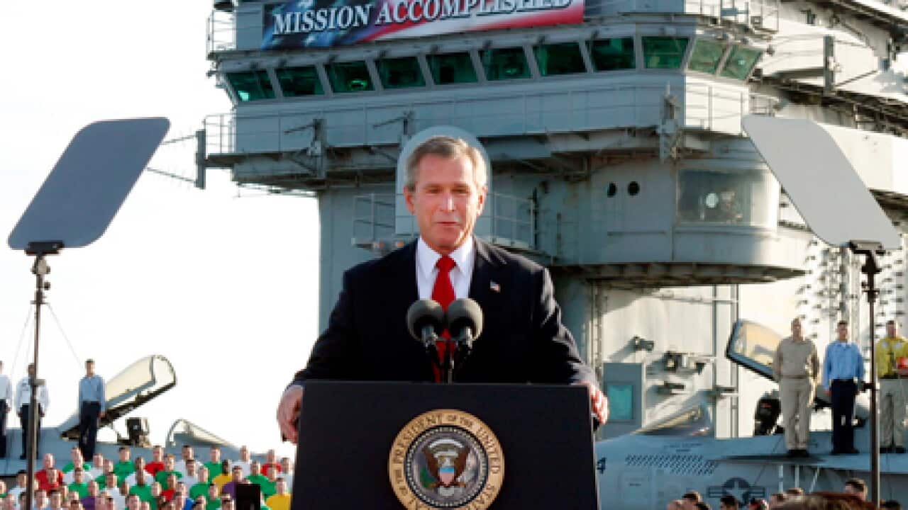 bush_iraq_banner_101109_B_ap_1565943722