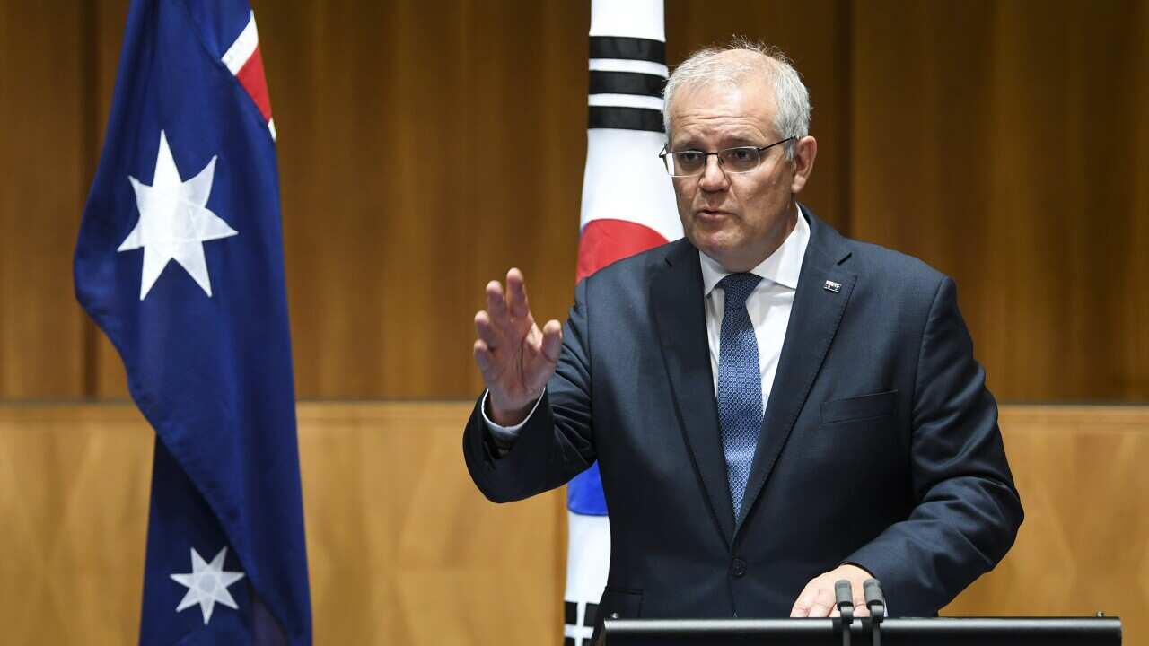 Australian Prime Minister Scott Morrison speaks to the media during a press conference at Parliament House, Canberra, Monday, December 13, 2021. President Moon Jae-in is on a two-day offical visit to Australia. (AAP Image/Lukas Coch) NO ARCHIVING