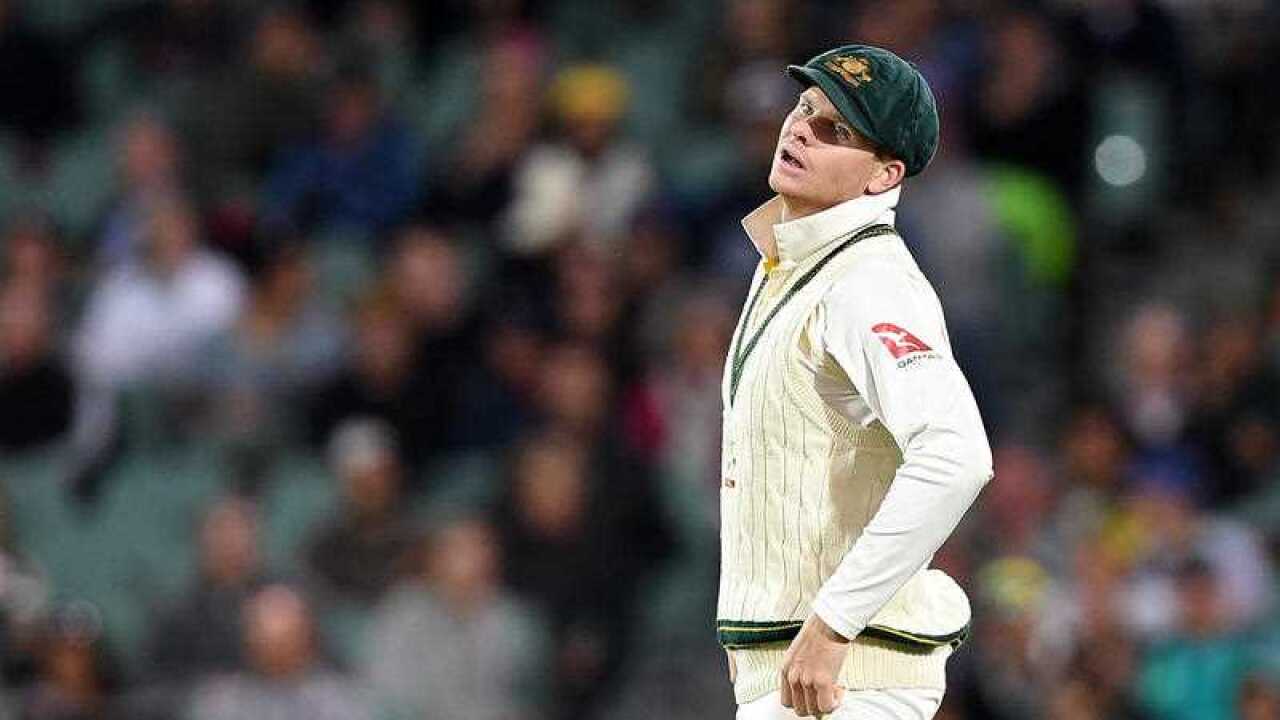 Australian captain Steve Smith reacts following a dropped catch.