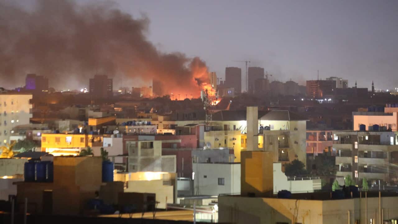 Smoke and fire in the distance in the Sudanese city of Khartoum.