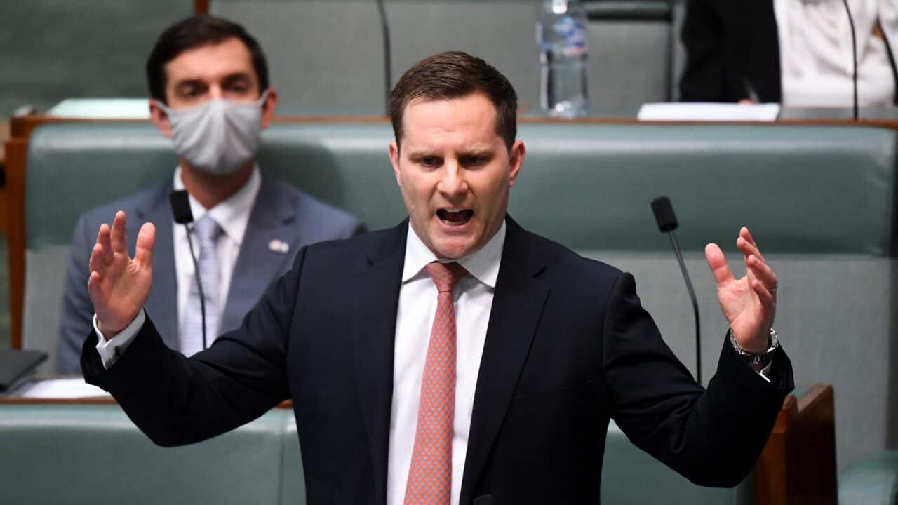 Immigration Minister Alex Hawke speaks during Question Time at Parliament House in Canberra.