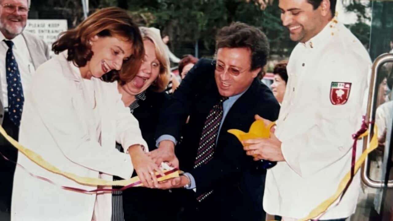 Sandra Nori (left) at an inauguration with Consul Antonio Catania.