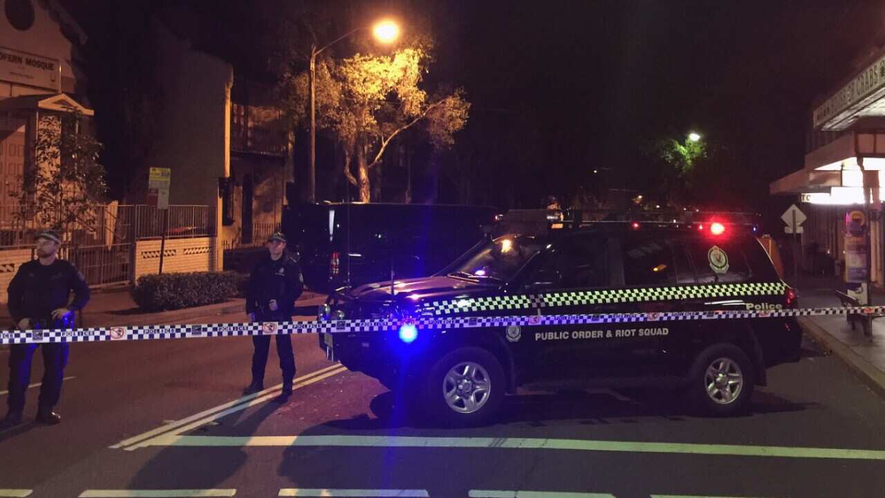 NSW Police and forensic officers at the scene of a counter-terrorism raid on a property in Cleveland Street in Surry Hills, Sydney, Saturday, July 29, 2017.