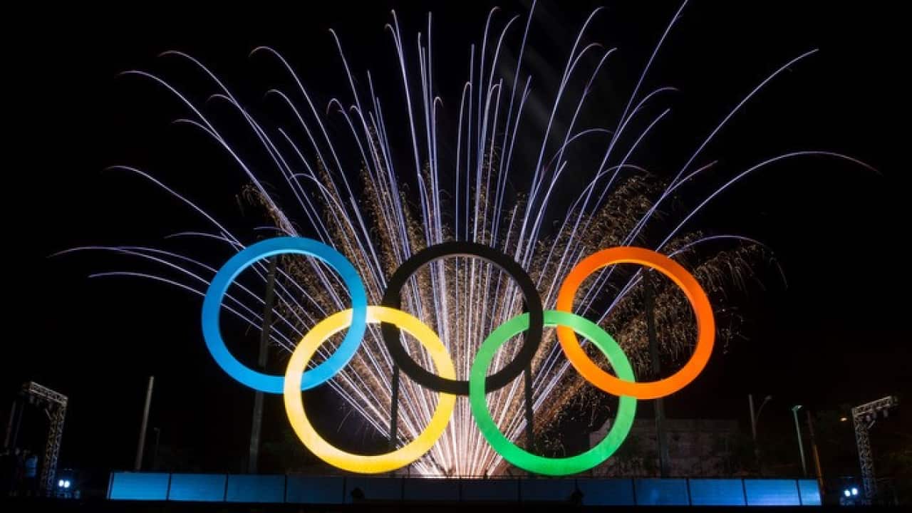 Fireworks behind the Olympic rings in Rio de Janeiro, Brazil
