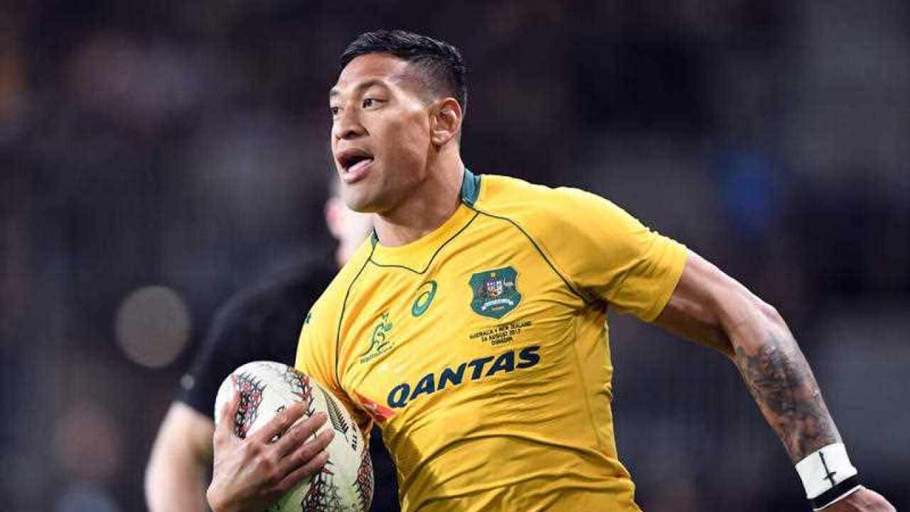 Israel Folau of Australia runs in the opening try against New Zealand in the Investic Rugby Championship test match.