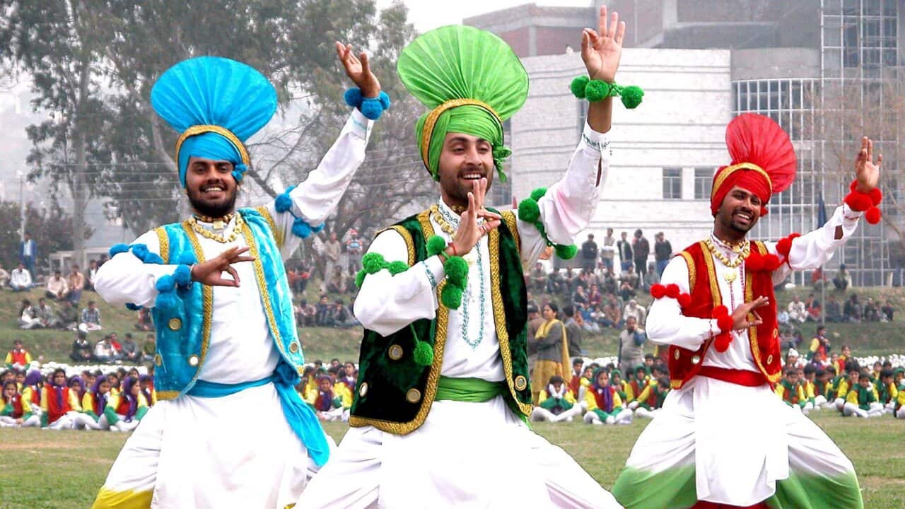 Indian men from Punjab Patiala University perform the Punjabi folk dance 'Bhangra'