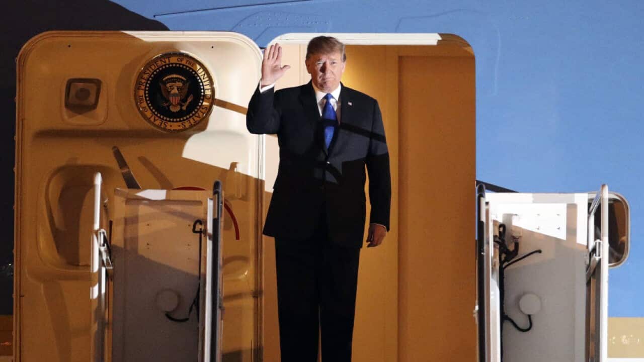 U.S President Donald Trump arrives at Noi Bai Airport before a summit with North Korean leader Kim Jong Un,