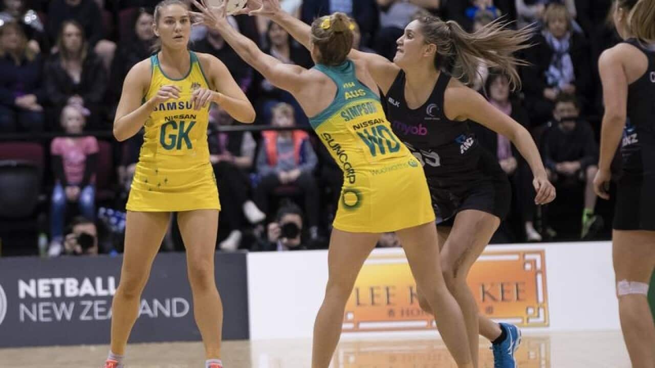 Gabi Simpson of Australia (C) and Te Paea Selby-Rickit of New Zealand