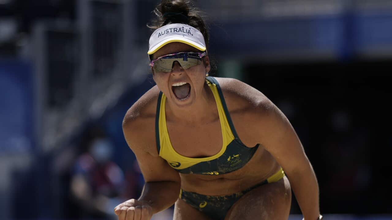 Mariafe Artacho del Solar, of Australia, celebrates a point during a women's beach volleyball semifinal match against Australia at the 2020 Summer Olympics, Thursday, Aug. 5, 2021, in Tokyo, Japan. (AP Photo/Felipe Dana)