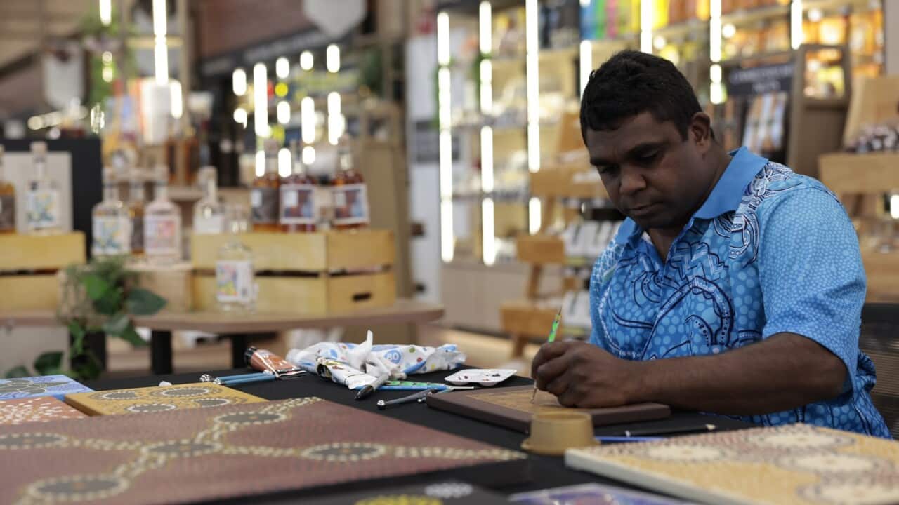 Travis Hogan during an artist in residence at Southern Providore at the Adelaide Airport.