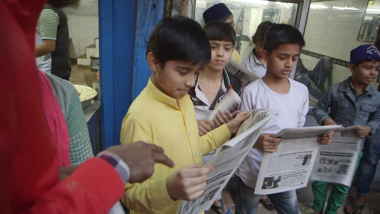 Children in India read Balaknama.