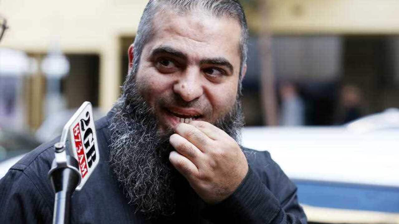 Alleged terror suspect Hamdi Alqudsi leaves Supreme Court after a bail hearing in Sydney, Thursday, July 2, 2015.