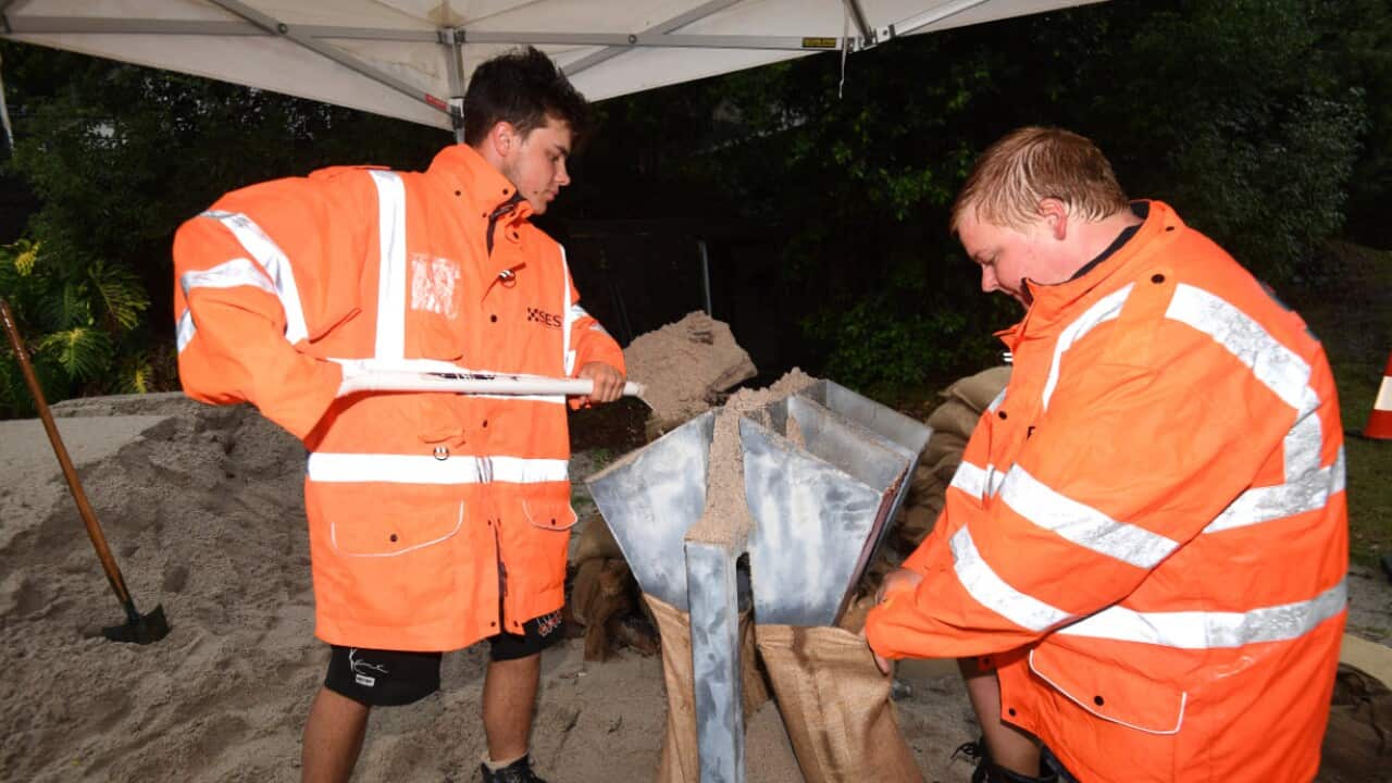 SES volunteers fill up sandbags at Murwillumbah, NSW, Sunday, 13 December, 2020.