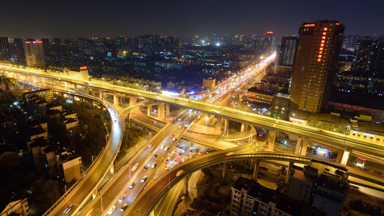 China intends to raise the number of urban residents to 60 per cent by 2020. (AAP)