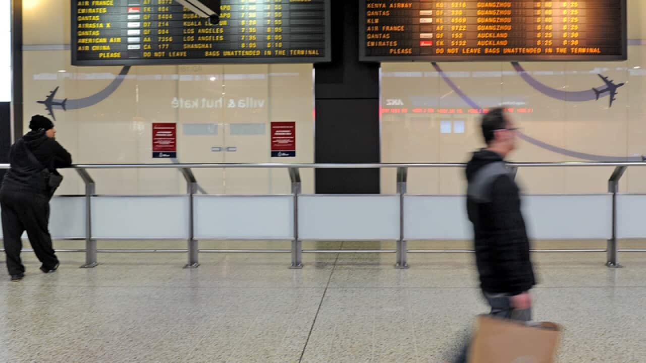 Travellers at the customs area of Melbourne Airport
