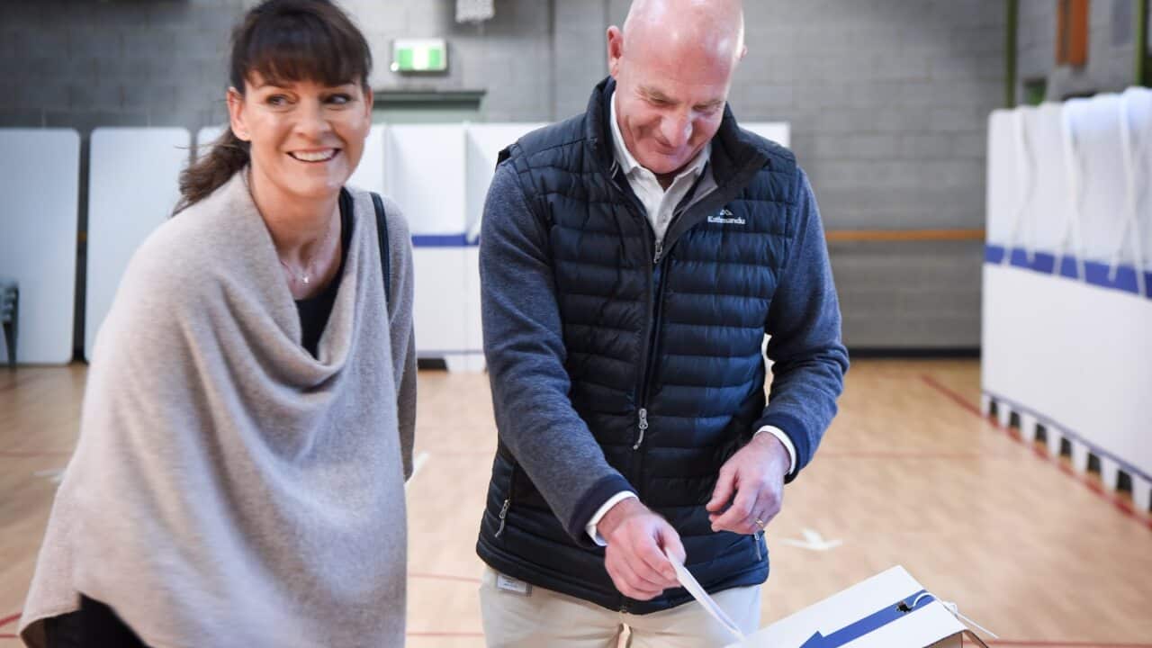 Tasmanian Premier Peter Gutwein and his wife Mandy voting at the East Launceston Primary School Parents and Friends Association Pavilion.