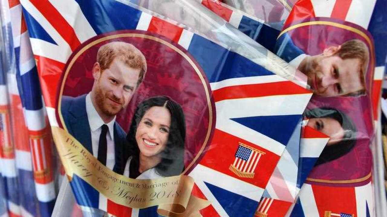 Royal wedding plastic flags with Prince Harry and Meghan Markle on sale at a store in Windsor, Britain, 16 May 2018.