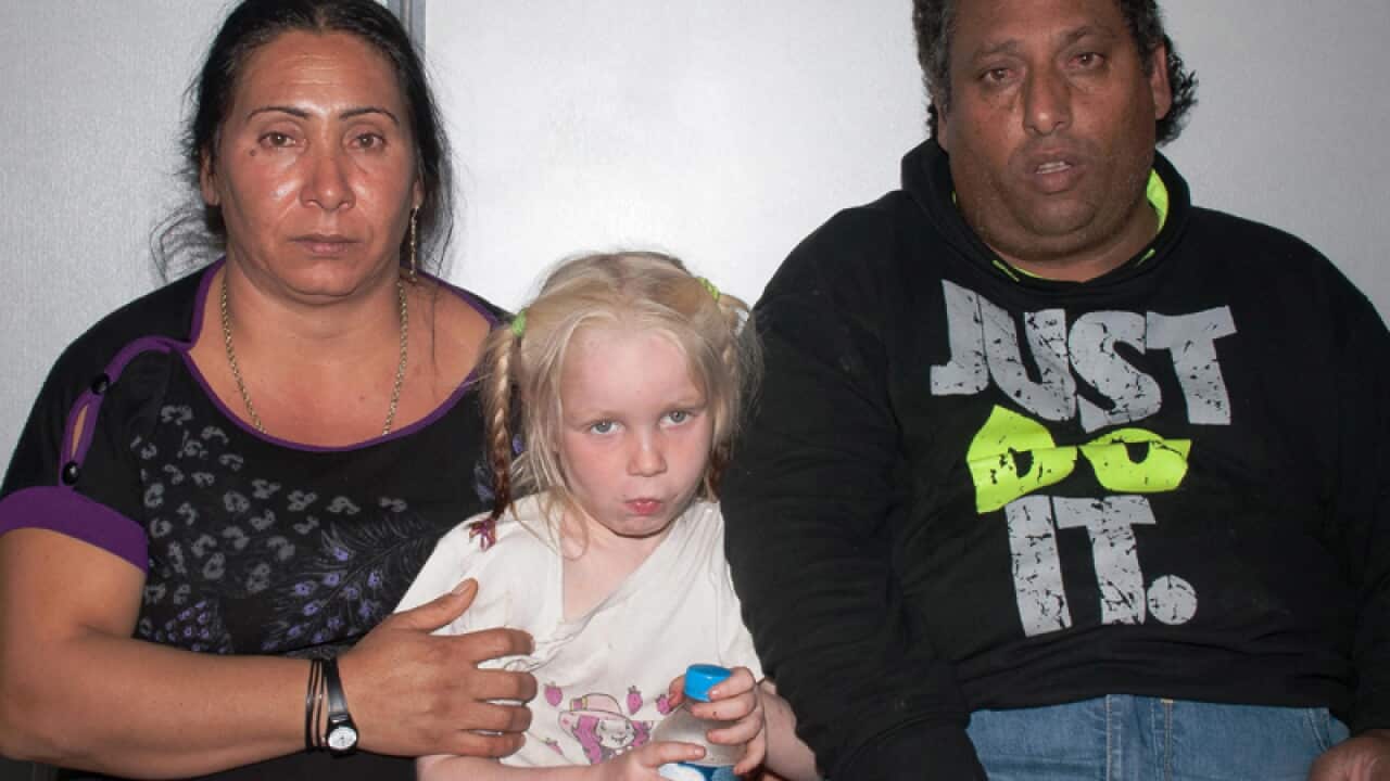A couple posing as the parents of Maria, dubbed the "blonde angel"