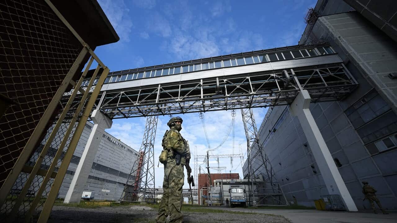 A Russian serviceman guards an area of the Zaporizhzhia Nuclear Power Station