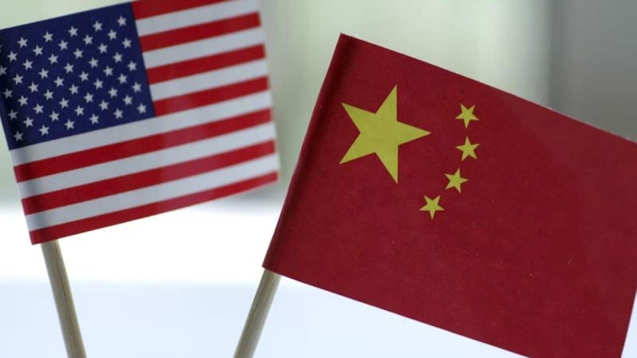An image of the US and China flags