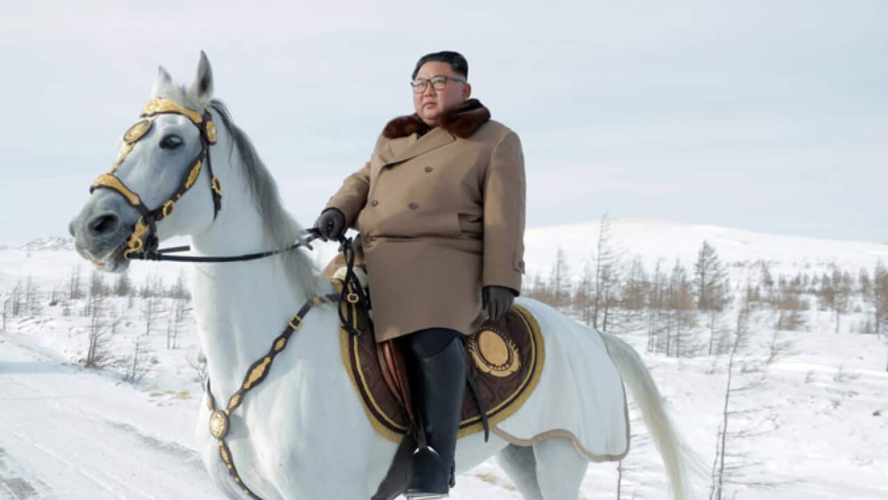 North Korean Supreme Leader Kim Jong Un rides a white horse near Mount Paektu