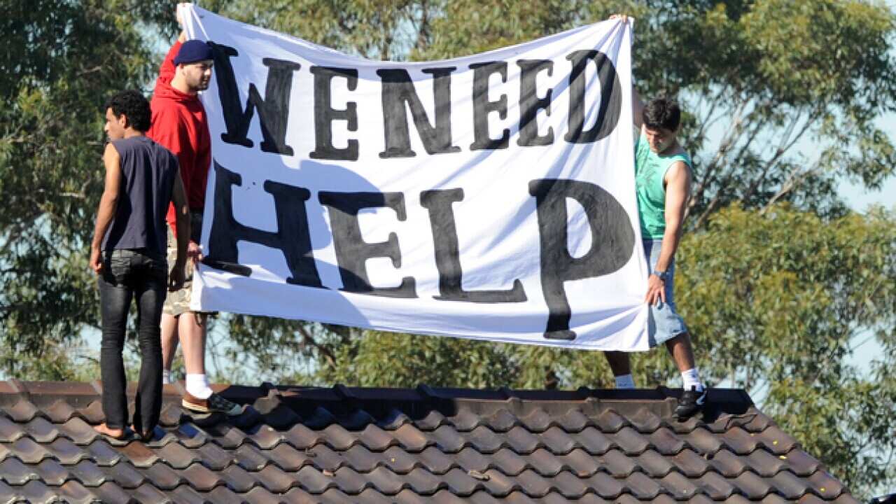 villawood_roof_L_110427_aap_1795968766