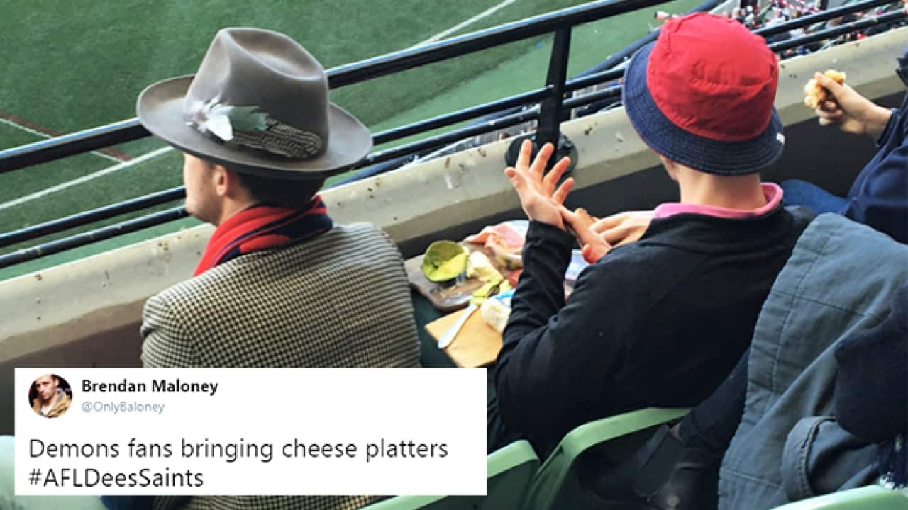 Twitter user Brendan Maloney shared this image of some Demons fans enjoying a cheeseboard at the MCG.