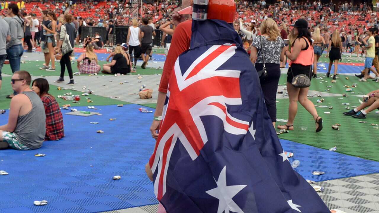 A woman wears an Australian flag at Big Day Out in Sydney