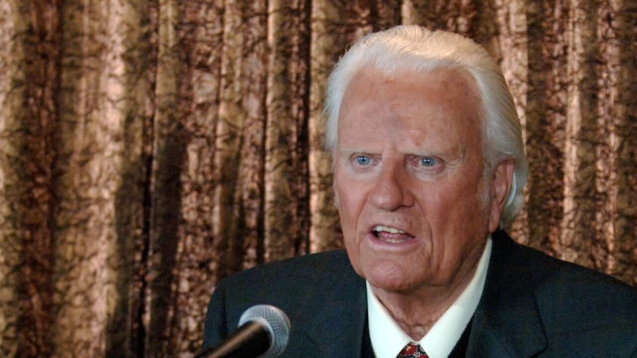 The Reverend Billy Graham speaks at Flushing Meadows Auditorium in Queens, New York.