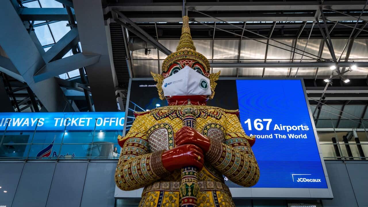 A masked Ramayana statue at the departures hall at Suvarnabhumi Airport on 12 January 2022.