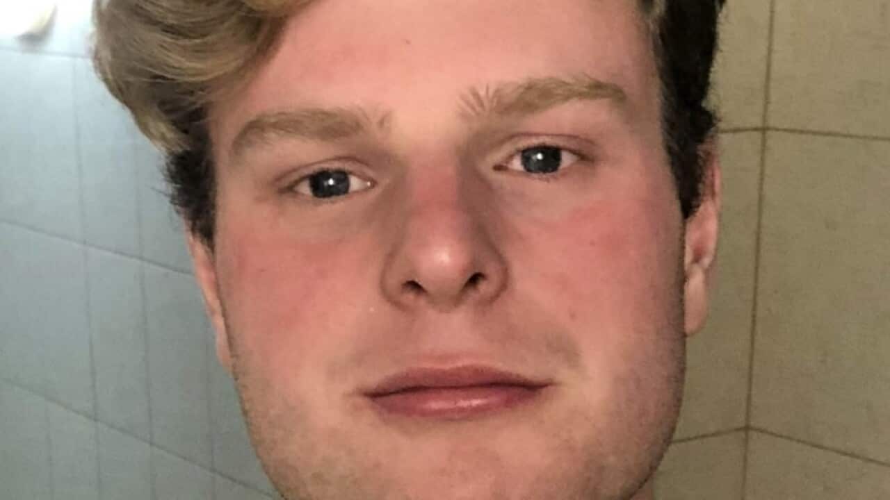 A headshot of a young man.