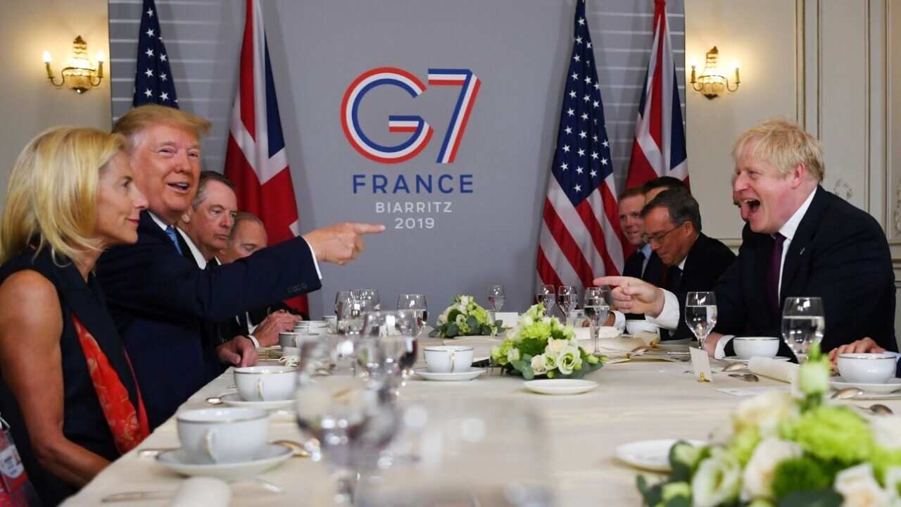US President Donald J. Trump (2-L) and Britain's Prime Minister Boris Johnson (R) hold a bilateral meeting during the G7 summit in Biarritz, France, 25 August 2019.