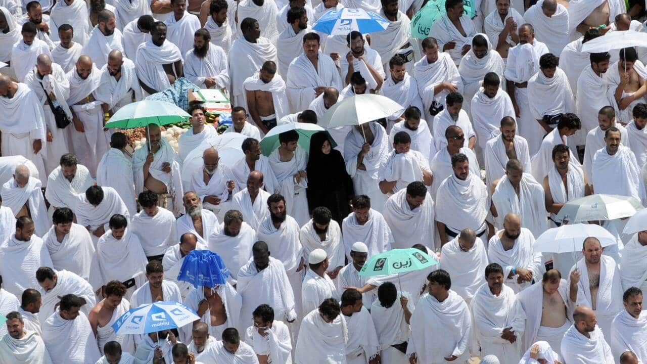 Hajj pilgrims perform noon prayers at the Namira mosque near Mount Arafat - AAP.jpg