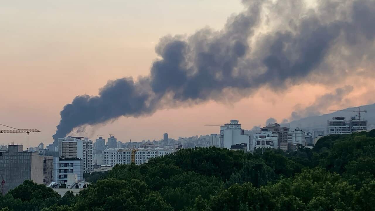 Iraeli emergency personnel in Tel Aviv at site of an Iranian strike