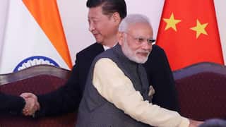 Indian Prime Minister Narendra Modi and Chinese President Xi Jinping, shake hands with leaders at the BRICS summit in Goa, India in 2016.