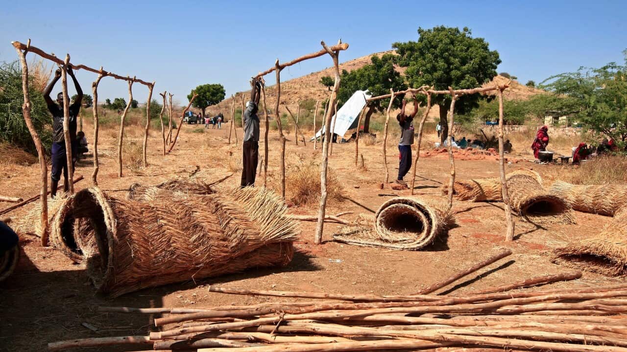 Ethiopians who fled into Sudan set up tents in the Um Raquba camp in Gadaref, east of Khartoum