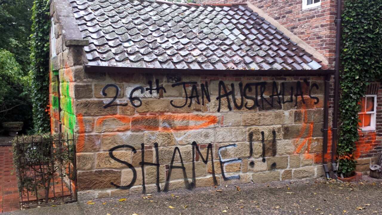 Graffitied on Captain Cook's cottage in Melbourne