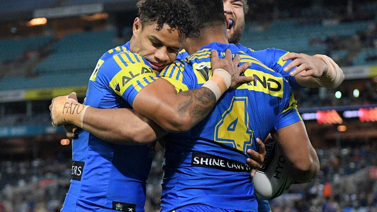 Eels players celebrate a try