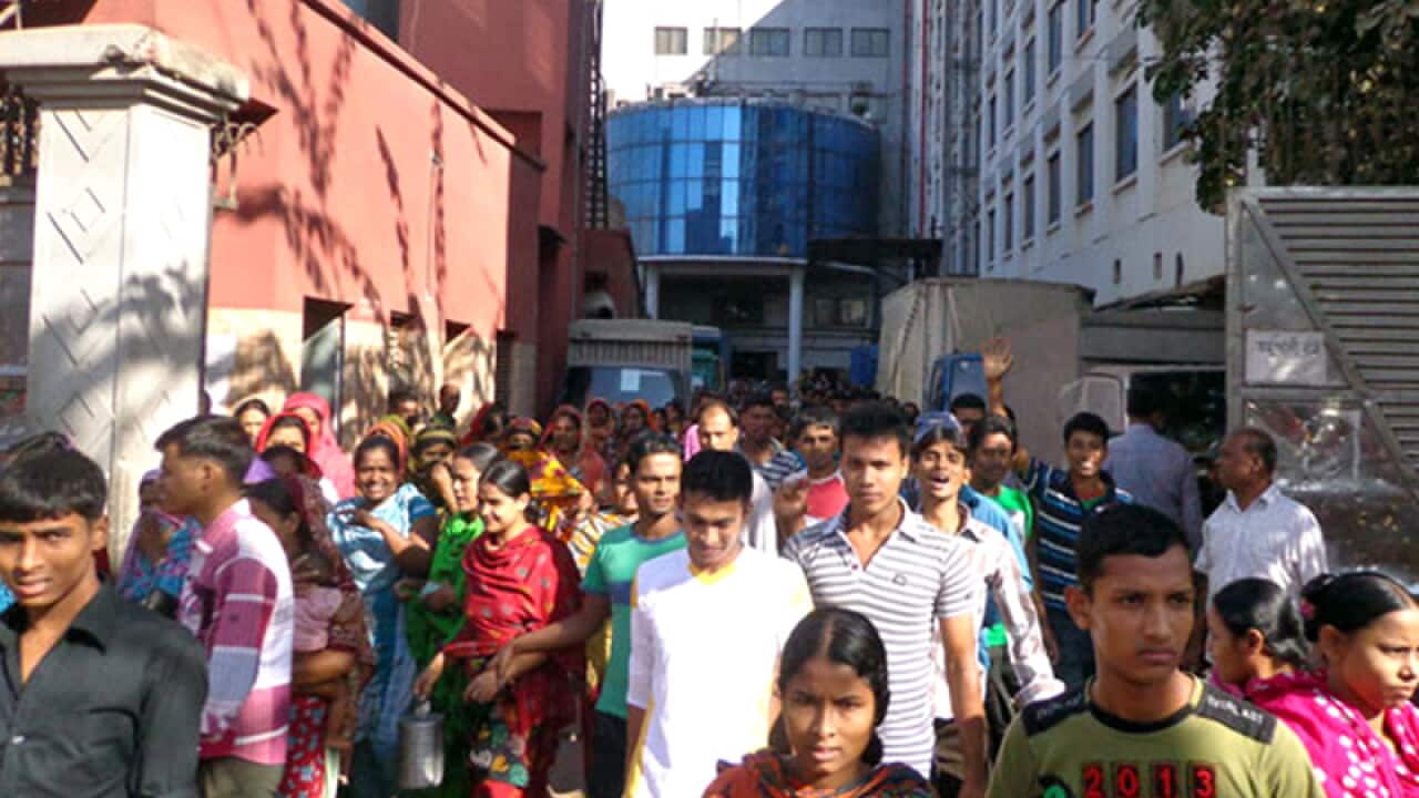 Bangladeshi garment manufacturers walk out of a factory