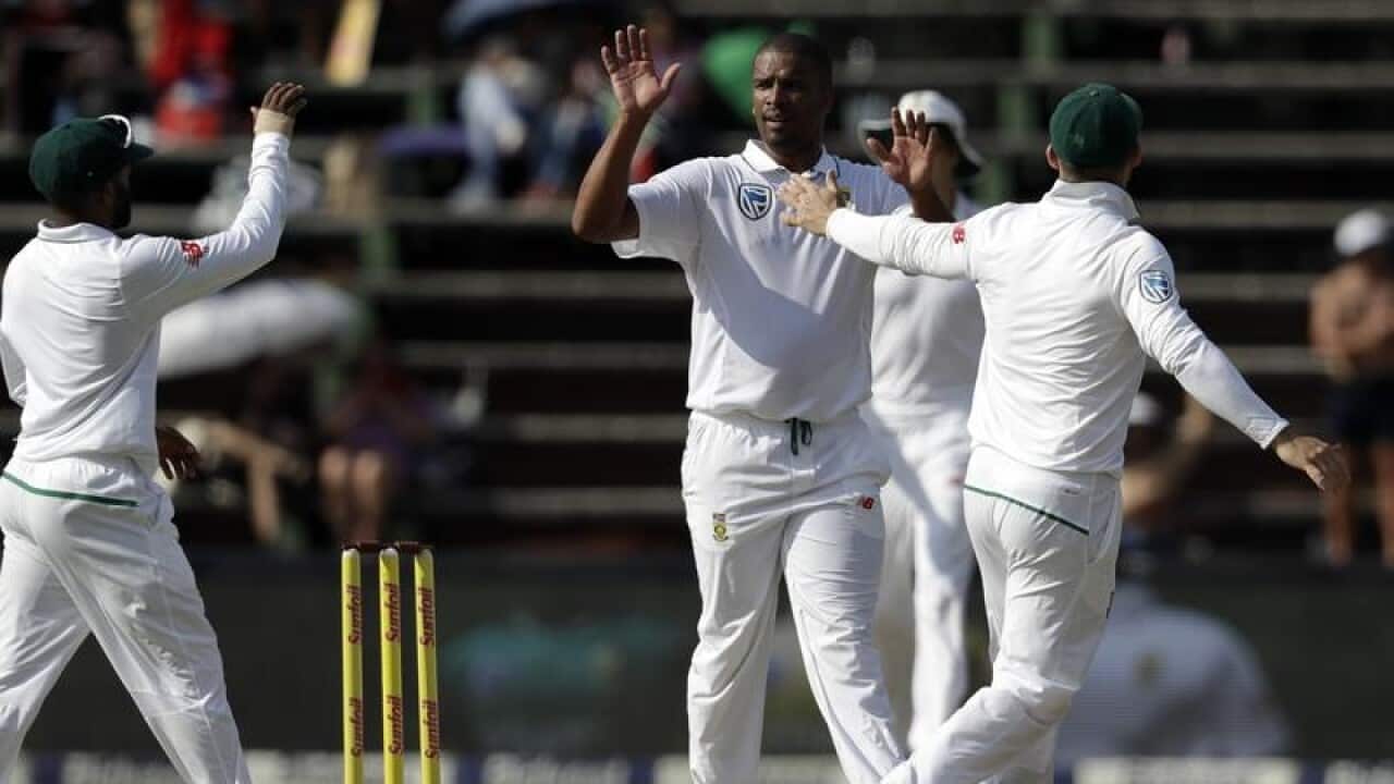South Africa's bowler Vernon Philander celebrates with teammates.
